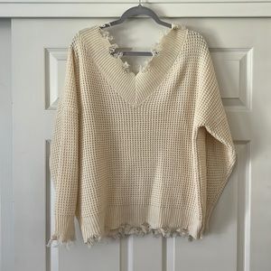 Frayed hem sweater